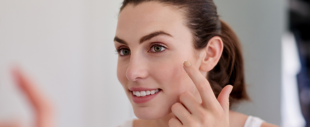 A Woman Examining Her Skin