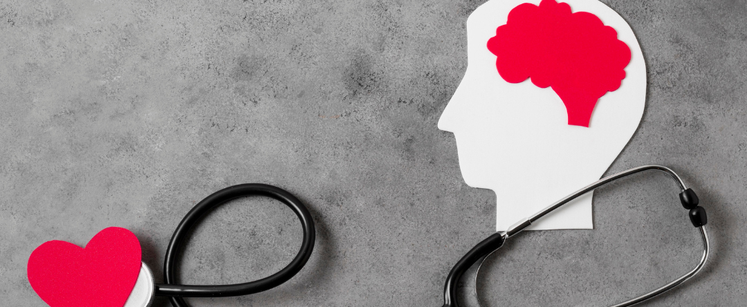 Paper Cut Outs Of A Brain And Heart With A Stethoscope